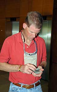 Jeff checks his passport before his flight back home