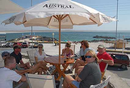 The team sits at the Dome on the beach in Bahia Inglesa