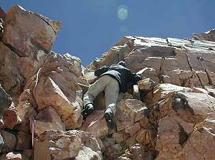 Karl on rock pitch, Ojos del Salado