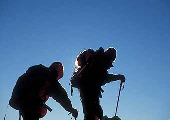 Climbers enjoy the morning sun on Ojos