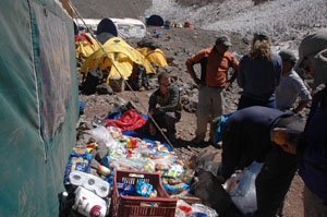 The team packs and organizes our gear and food for higher