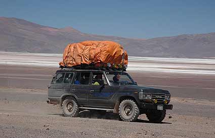 A fully loaded Samu heads for the next camp
