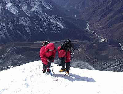 Preparing to rappel off the summit of Ama Dablam