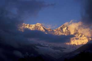 Everest and Lhotse peak through the clouds