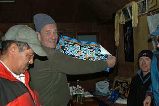 George proudly holding up his new Thanka