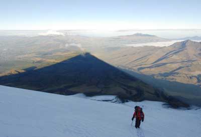 Cotopaxi's shadow below us as we climb at dawn