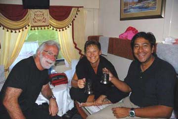 Wes, Lida & Alex sip morning coffee on the Midnight Train to Moscow 