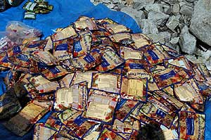 Mountain of AlpineAire Food being repacked for higher camps