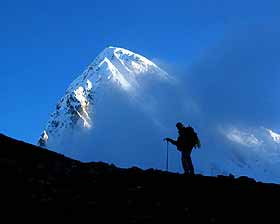 Kevin climbing up Kala Pattar in early morning light.