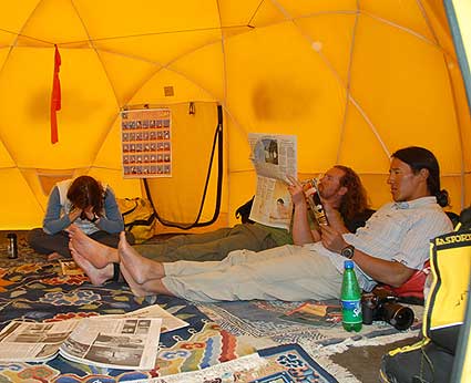 The team catches up on some reading back at base camp