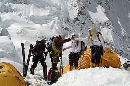 Team congratulates one another after arriving at Camp 2