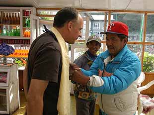 Peter receives khata blessing from Pasang