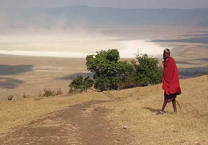 We passed solitary Masai figures wearing their red robe in the distance