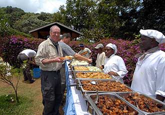 Ken enjoying the lunch buffet we had prepared for them at the trail head