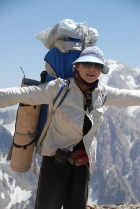 Our cook, Sophia, celebrates arriving at the top of Chimtarga pass