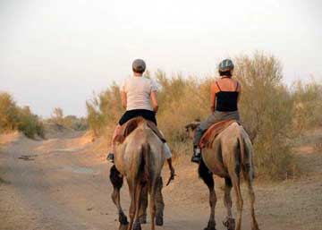 The girls ride off into the sunset, after getting settled at Yurt Camp