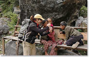 Cami shares her photos with the local children