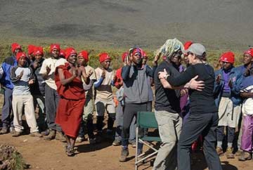 She celebrates with a dance when she has met her friend