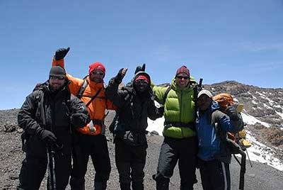 Team reaching the top of Stella Point