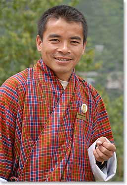 Our driver, Prim, wears typical Bhutanese dress, a Gho