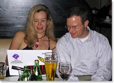 Leila showing John the dispatches from the first Elbrus trip