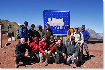 Team gathers for a photo along the Chilean border