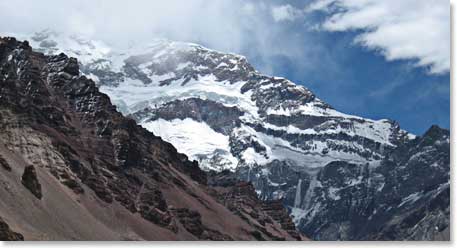 The peaks of Aconcagua are towering over the team as they climb higher and higher
