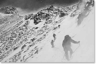 Strong winds hit the team hard as they approach the summit