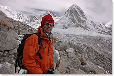 Edouard along the trail into Gorak Shep, with Pumori behind