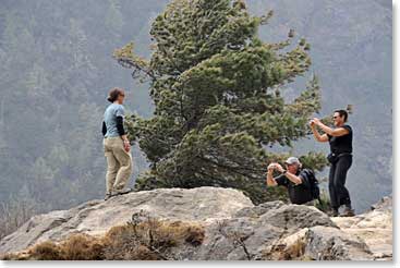 The team takes an opportunity to take photos with the spectacular scenery