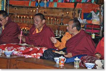 The monks enjoy their dinner of Mo Mo’s