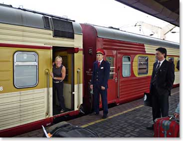Carol peaks out of the train car and breaths in the Moscow air