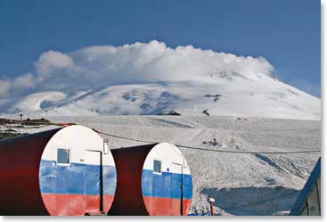 View from the barrels of a large cloud beginning to blanket Mt Elbrus