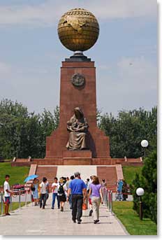 Mike and Kathy stroll toward Independence Monument. Made from the melted bronze of a Lenin statue, this globe represents Uzbekistan’s independence