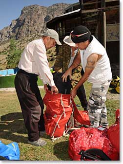 The guide and porters packed our loads before we set off for the first day of trekking