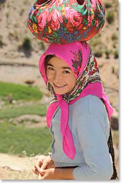 The last day of our trekking we were joined by this Tajik girl carrying loads to her village.