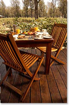 Relaxing and comfortable: the bedroom terrace at Arusha Coffee Lodge.