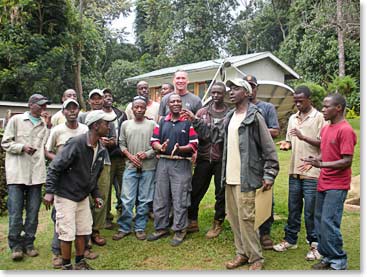 The staff celebrate with us as our climb comes to an end.