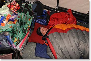 Wally and Charlie camped inside the communications tent so that they would be ready for the news that might come over the radio during the night.