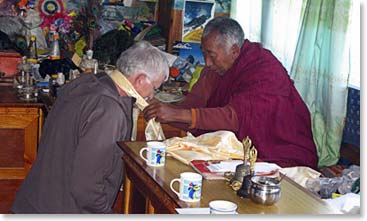 Doug is happy to be blessed for the second time by Lama Geshe.  His first time was on his last trip in 2006.