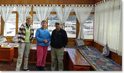 Chris, Brenda and James check out the sunroom of our lodge in Pheriche.