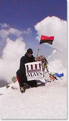 Scott with his business school flag on the summit.