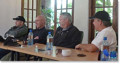 Doug, Rob, Jamie and David attentive at the briefing