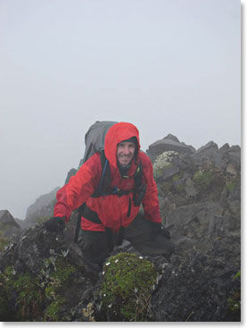 Hugo climbing upward toward the summit