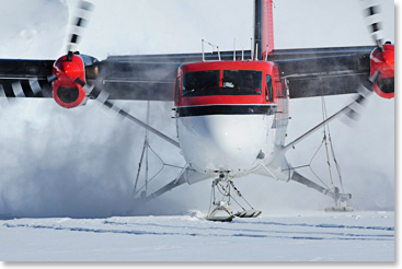 The Twin Otter makes a snowy landing at Camp 1.