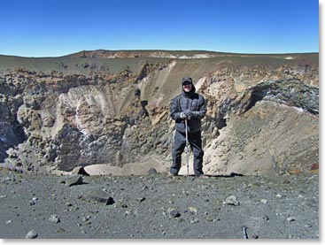 Still full of energy after a tiring summit day, Scott explores the crater with Julius.