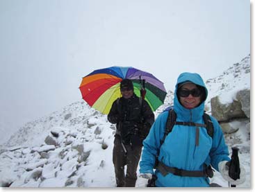 Min and Jenny hike through the snow.