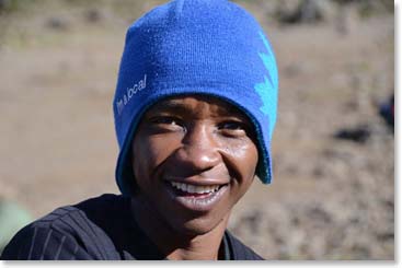 Sprian, who has been on all Doc Martins previous Kilimanjaro climbs, at the top of the wall.