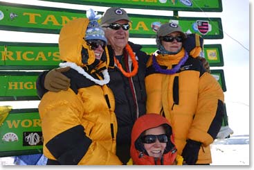 A dream come true! Doc with his daughters on the summit of Kili.