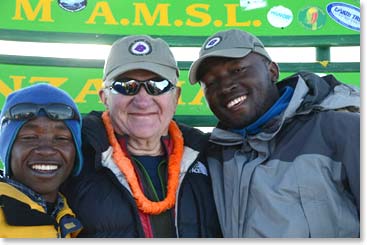 Doc with his climbing team, Sprian and Polight – they came all the way up, step by step together 